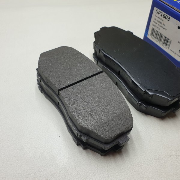 Колодки тормозные передние Mazda ER3P ER# CX-7 TB# CX-9 LY3P MMC KL1T L200 Sangsin SP-1603 (NP5015)
